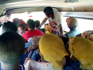 This is from inside the taxi-brousse we were on when we went to our friend’s village. You can’t really see all the people in front (because the lens isn’t wide-angle enough), but you can see they’re packed in tight! And this was still several people before it was full – at that point I couldn’t move my arms around well enough to get a good picture!