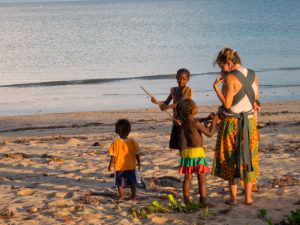 Lora and Matimu playing with some kids on our first visit to Nosy Mitsio