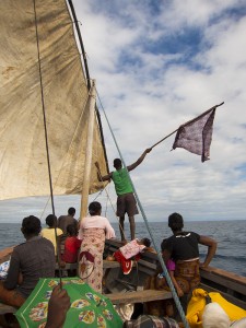 Stranded in the boat leaving Nosy Mitsio. A passenger is waving a flag in hopes of getting someone's attention.