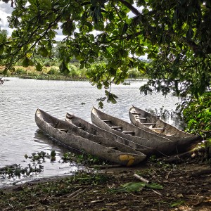 Madagascar 4 photos - fishing canoes on the Pangalanes river