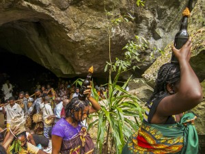 Antakarana people presenting offerings to their ancestors at the royal cave, during the time the “doors are open.”