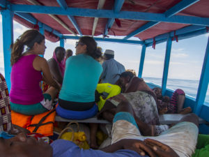 Some ladies on our team talking and spending time with ladies from our island while on our boat to mainland Madagascar.