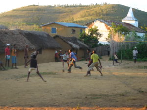 Boys playing soccer in a semi-rural Madagascar village.