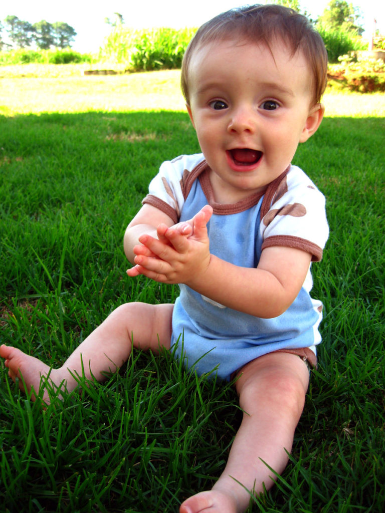 Matimu playing in the grass and having fun, after recovering from his accident.