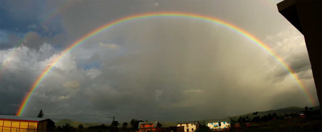 A rainbow just outside our window one day after a heavy rain. No matter the storms of life or the struggles of our work, we know that a day is coming when all will finally be made new!