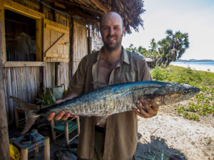 One of our team members with a nice big "ango", the sort of fish we often catch with a trolling lure on our boat trips to and from the Port.