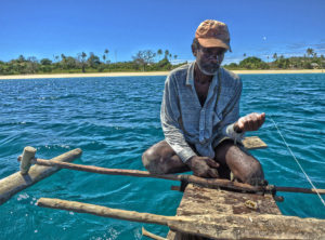 Fishing with Papan'mwana (the king of Nosy Mitsio) on his little canoe, out in front of our village.