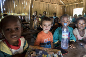 Matimu at his first day of school on Nosy Mitsio. Another child on our team (sitting behind Matimu) has been going to the local school for about a year now.